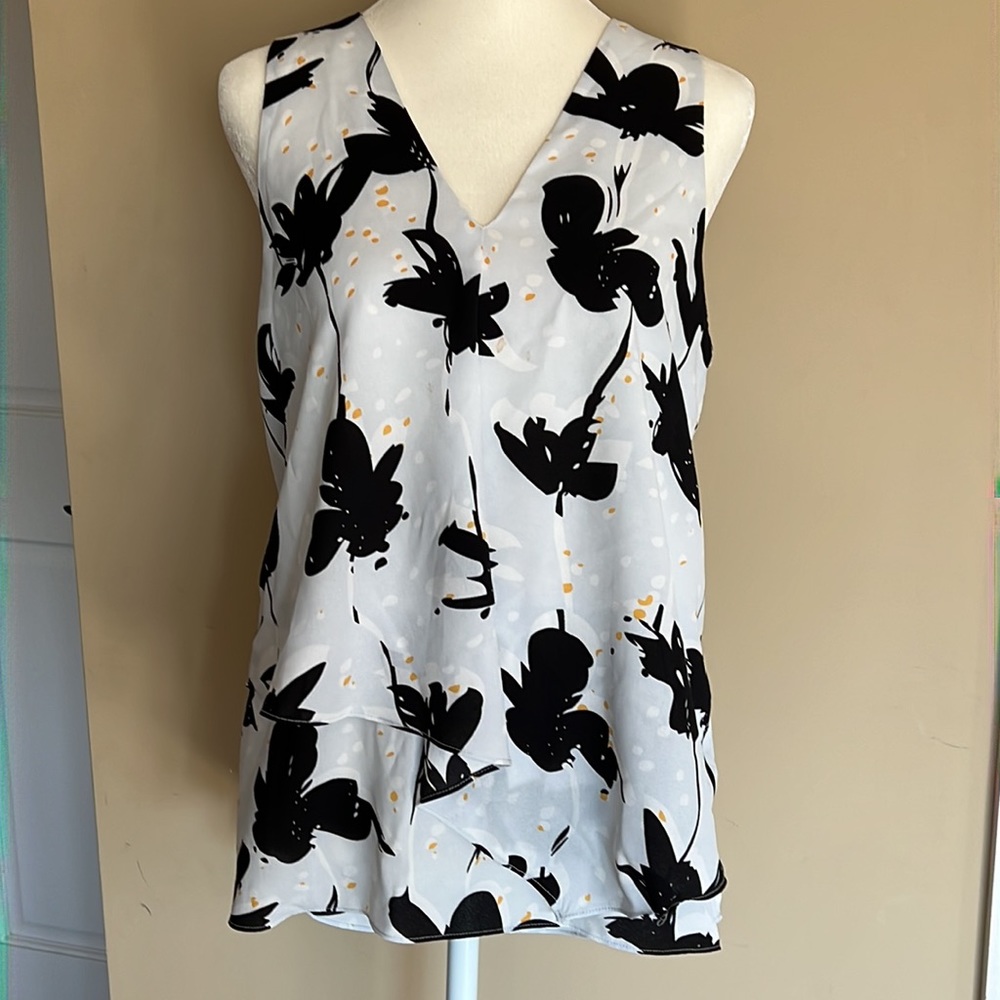 White top with black flowers